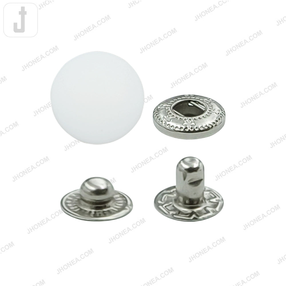 Smooth round plastic 4-part snap button fasteners in white with silver, available in 15mm and 17mm.