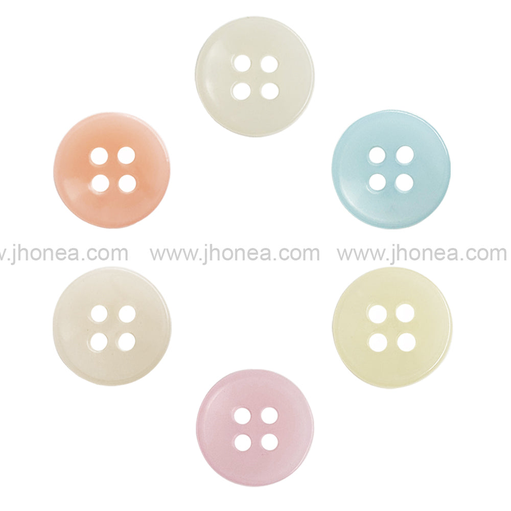 Assorted pastel 4-hole polyester garment buttons in cream, blue, yellow, pink, beige and peach